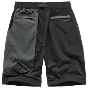 Black cyberpunk cargo shorts rear view displaying elastic waistband and back pocket construction