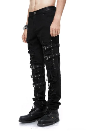 Men's black tactical gothic skinny jeans with metal buckle straps and lace-up ripped details, side front view on shirtless model