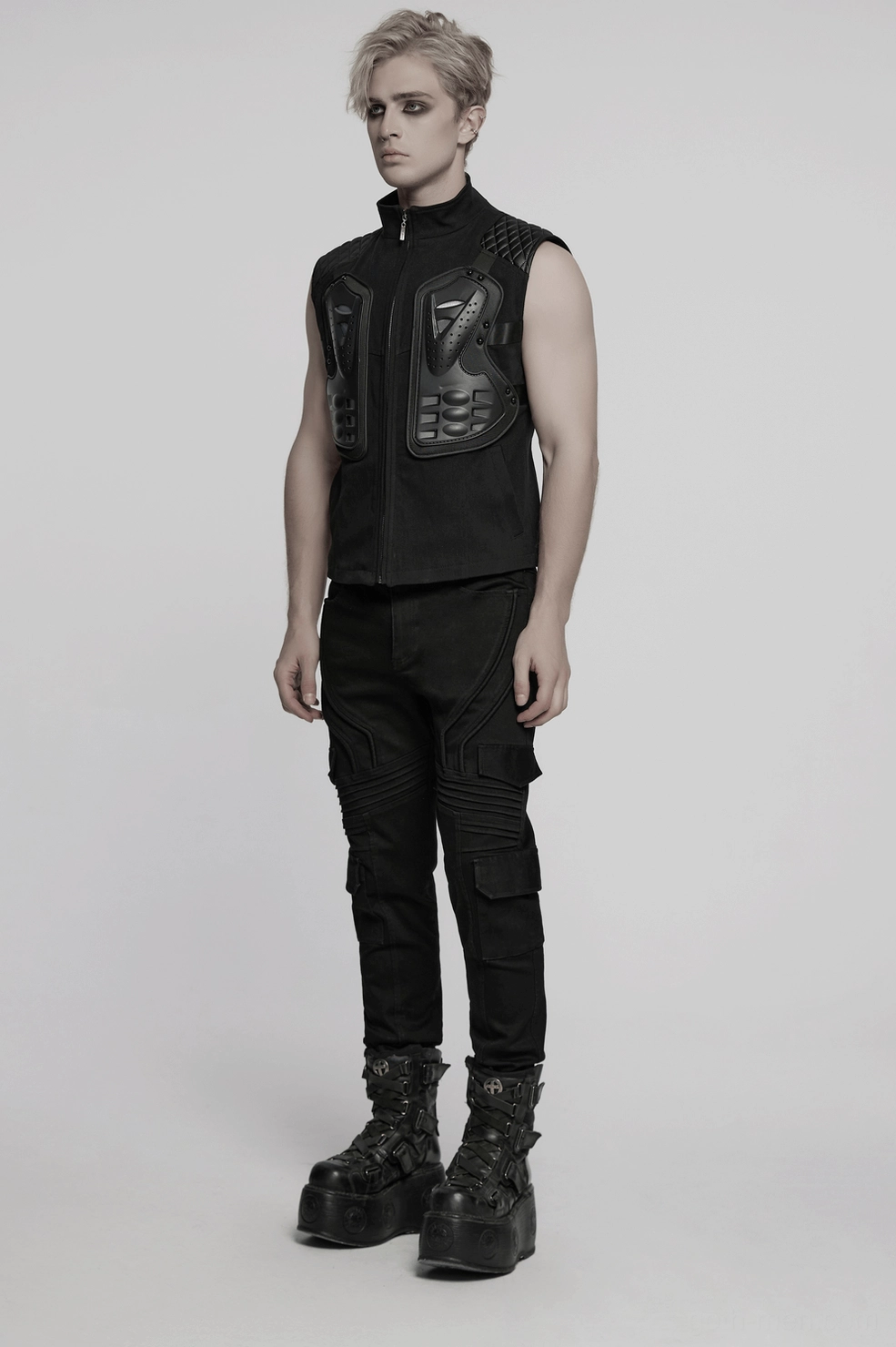 Three-quarter view of gothic black tactical armor vest showing 3D panel dimension