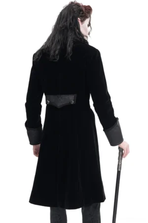 Gothic Victorian tailcoat rear view showing long tail hem, back waist decorative tab, and dramatic silhouette - male model wearing with walking cane