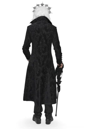 Black damask brocade gothic tailcoat rear view with model wearing crown and holding walking cane, showing full extended hem