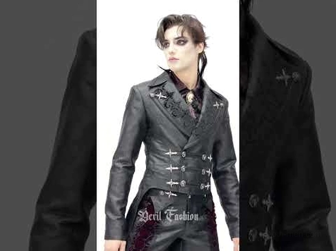 Black gothic tailcoat with embossed brocade fabric paired with matching pants - male model 3/4 front angle showing cross brooch details