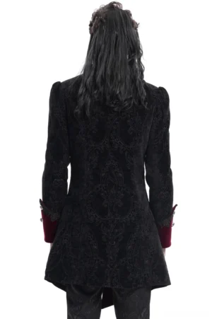 Gothic tailcoat back view displaying embossed paisley brocade pattern - long hem design on model with long hair