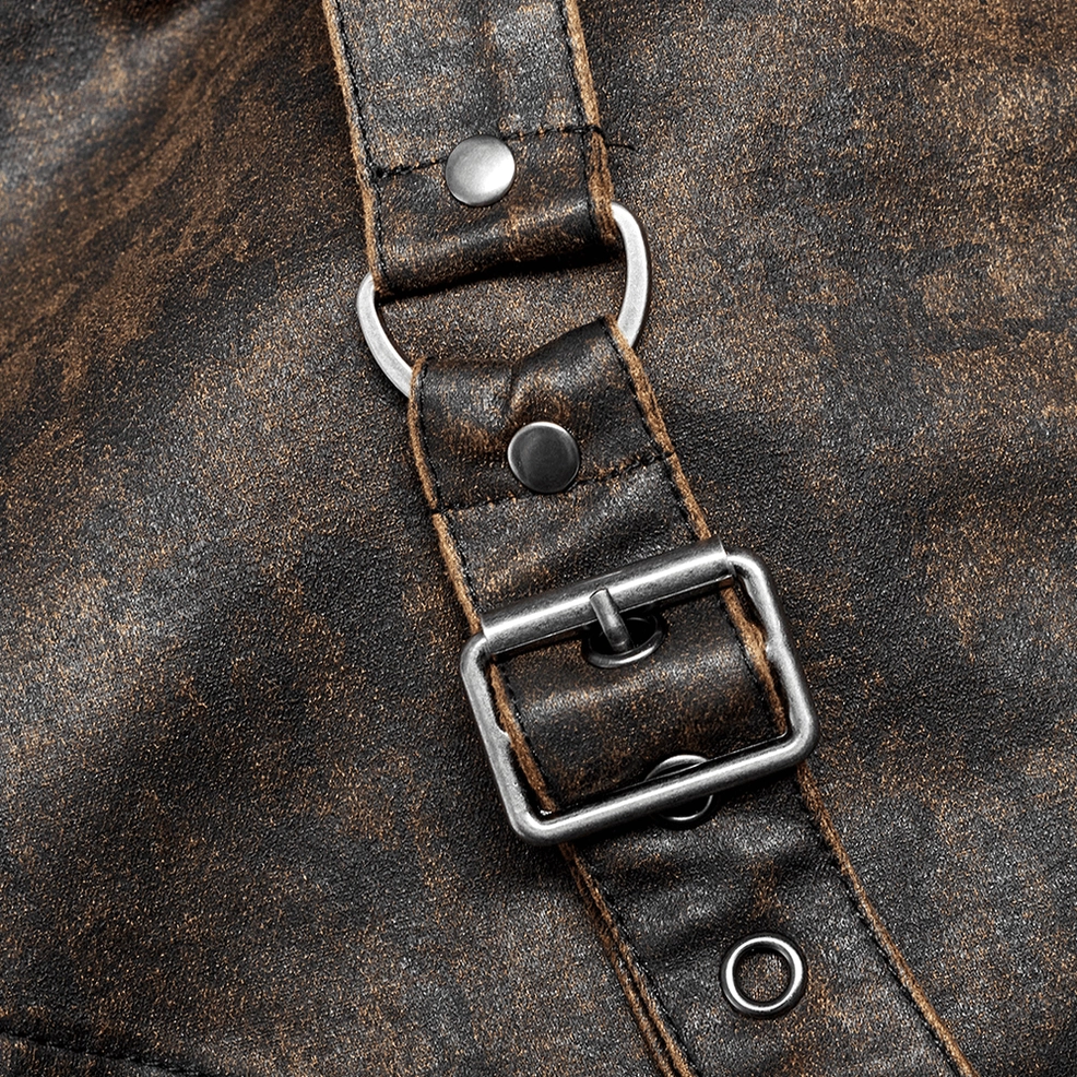 Close-up of distressed gothic tailcoat shoulder hardware showing distressed brown faux leather, metal D-ring attachment, and buckle set configuration