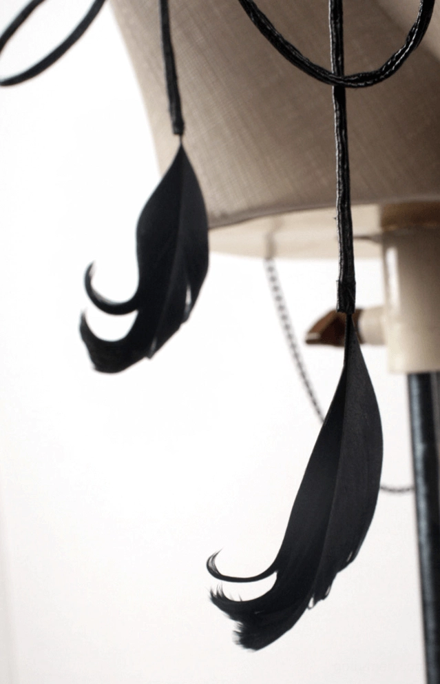 Black feather clothing ornaments with black cord straps and metal hardware for gothic vest decoration and customization