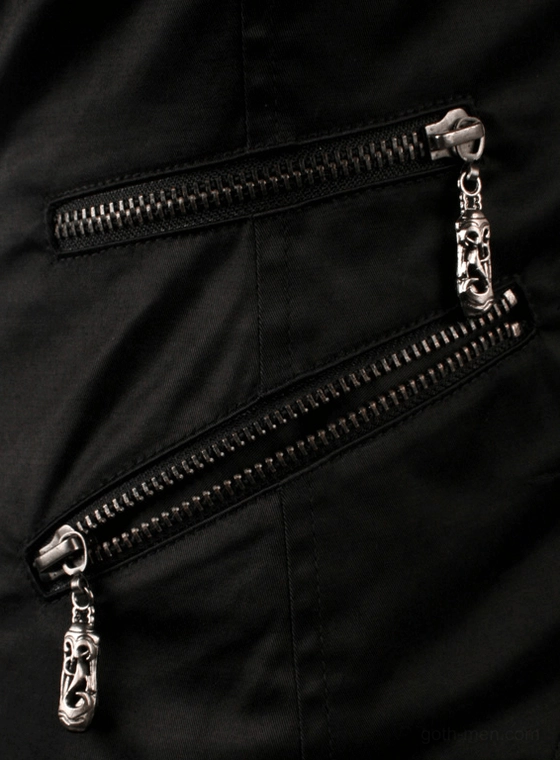 Close-up detail of gothic vest featuring skull-shaped metal zipper pulls and dual diagonal zipper pockets on black fabric