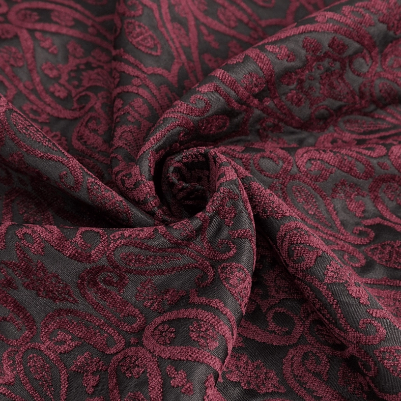 Full-length profile view of men's wine red gothic tailcoat with cross pendant zipper and damask pattern showing architectural silhouette