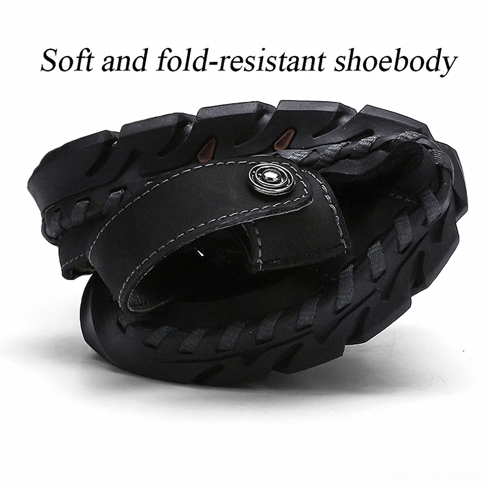 Men's tan genuine leather gothic sandals with perforated upper and non-slip traction - bottom sole