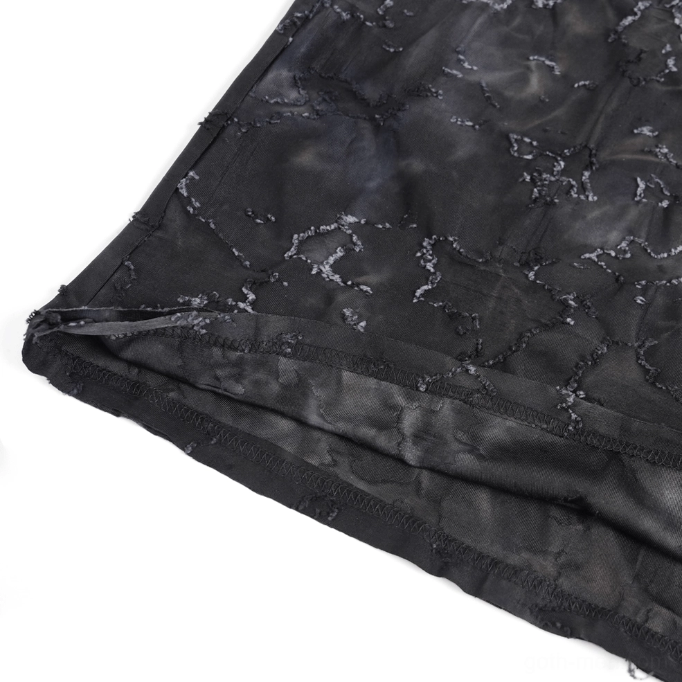 Black distressed eyelet tank top showing shoulder strap rivet construction and torn fabric aesthetic