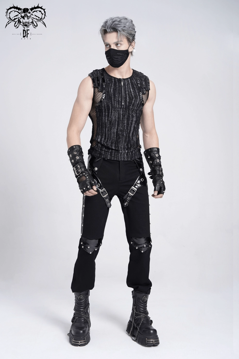 Construction detail showing quality of synthetic leather accents and metal hardware on gothic tank top