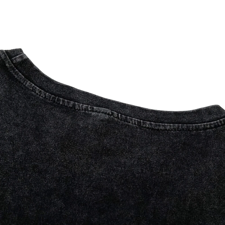 Close-up of ribbed crew neckline trimming on washed black cotton gothic tank top