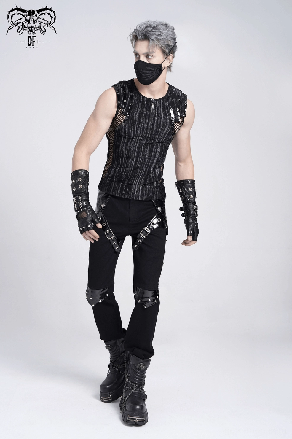 Detailed construction view of mesh side panels and metal buckle components on industrial gothic tank top