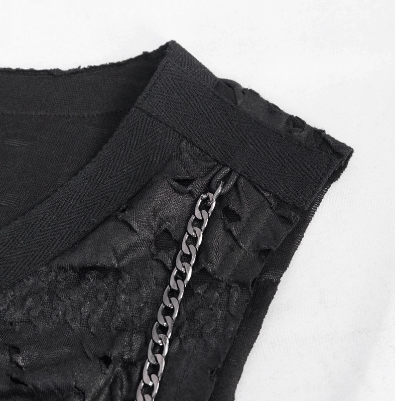 Shoulder and side armhole detail of gothic tank top with ribbed construction and chain decoration