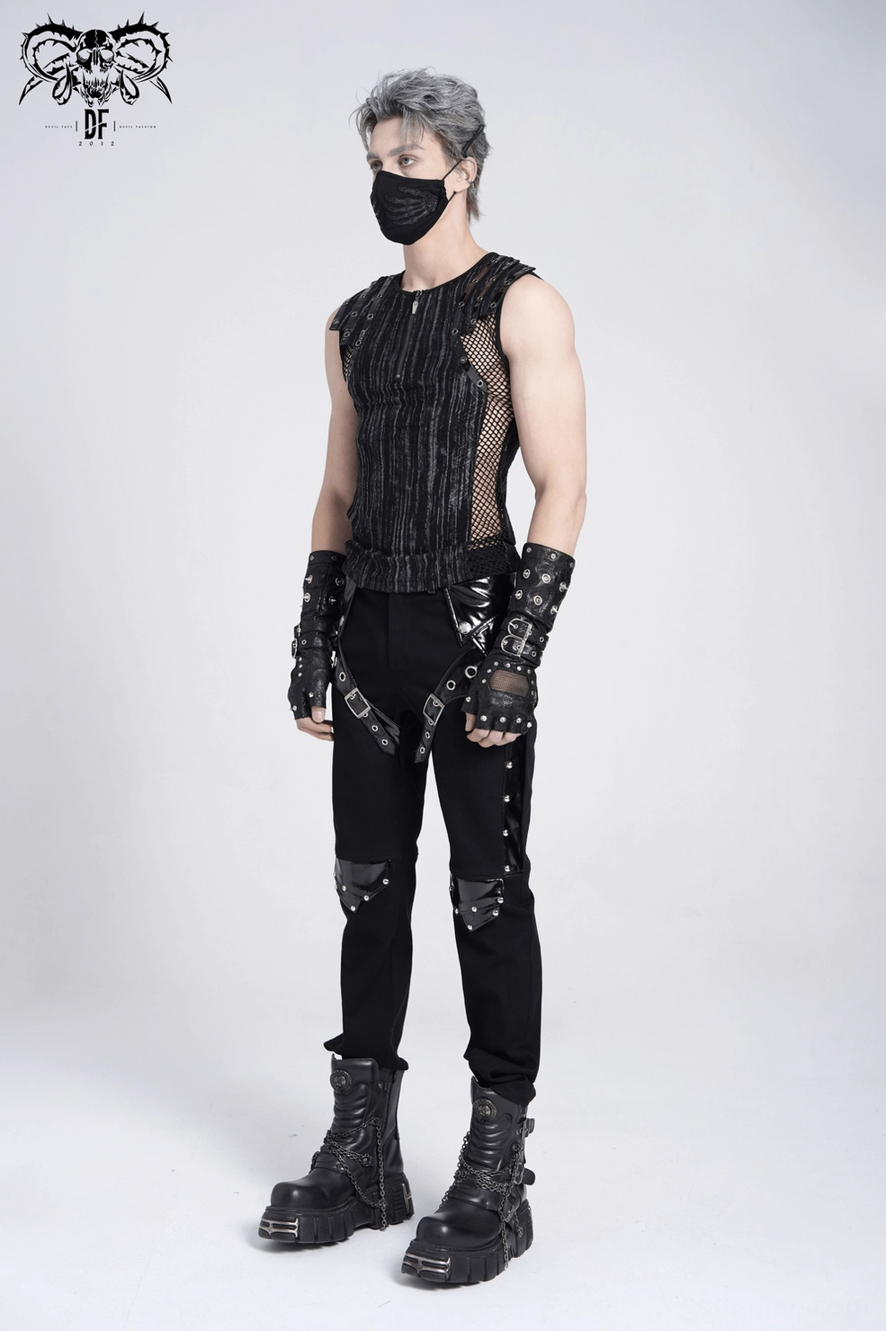 Three-quarter front view of black gothic mesh tank top highlighting half-zip and shoulder grommet design
