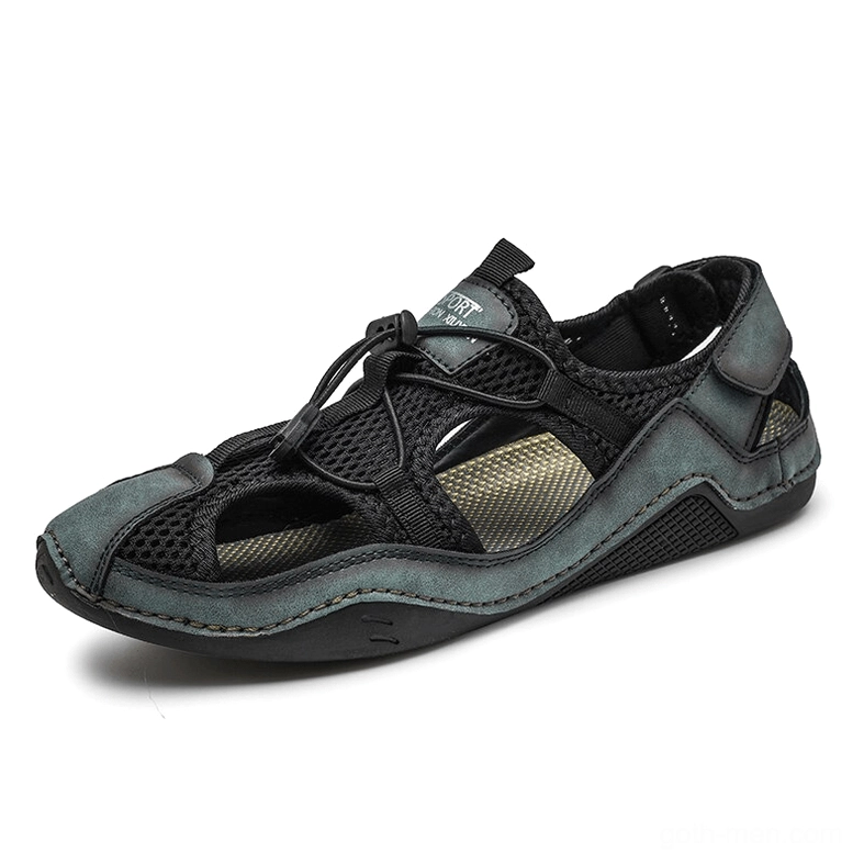 Gothic sandal dark teal tone side view displaying closed leather toe design and ankle structure