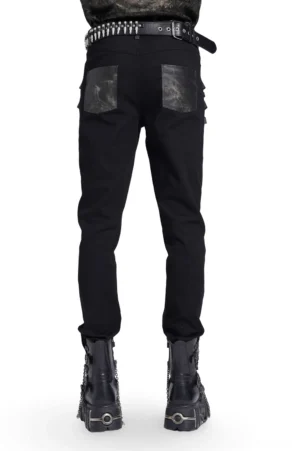 Black gothic slim fit pants rear view showing patch pockets and studded belt detail on male model