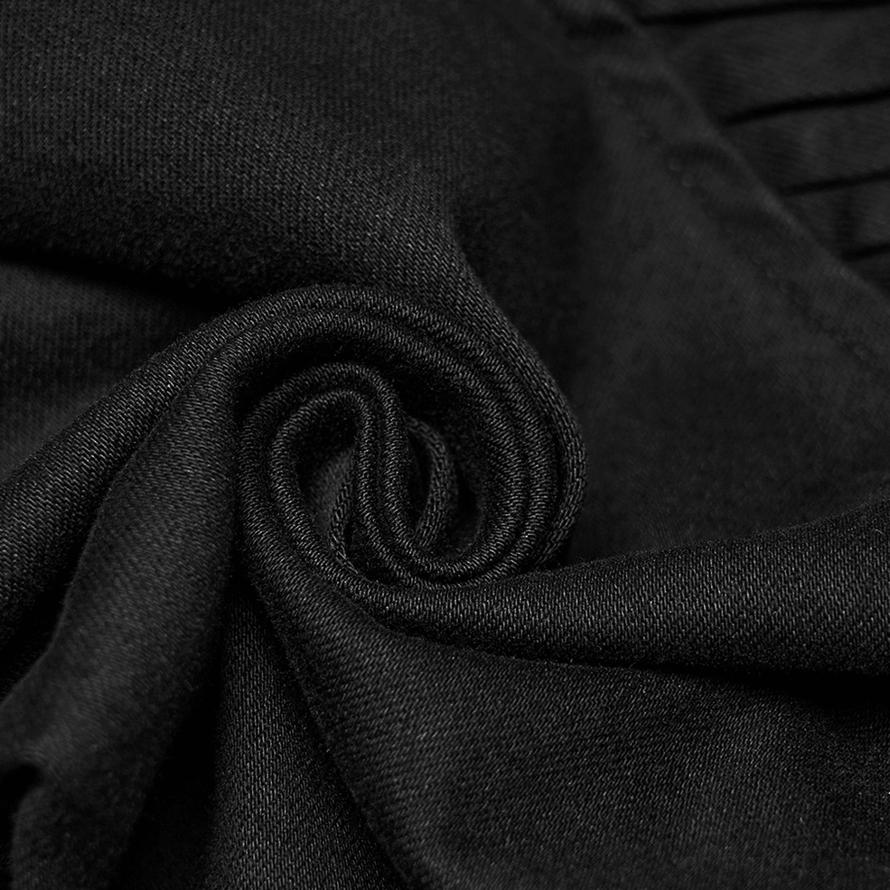 Black gothic cyberpunk techwear pants structural detail showing pleating construction and tailoring