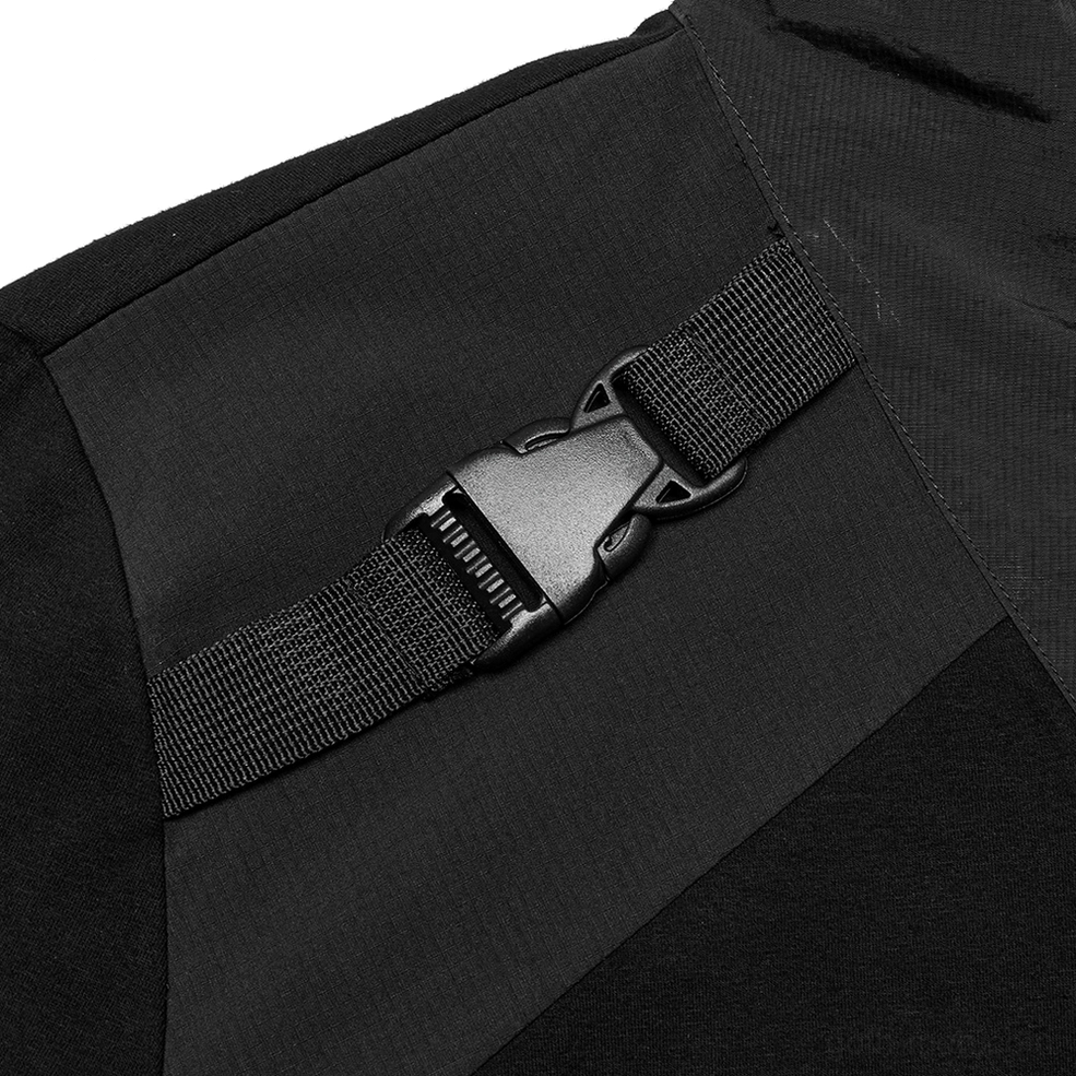 Close-up detail of tactical shoulder buckle strap with nylon webbing and matte black hardware