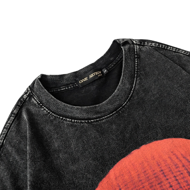 Gothic t-shirt neckline detail with branded neck tag, washed black cotton fabric