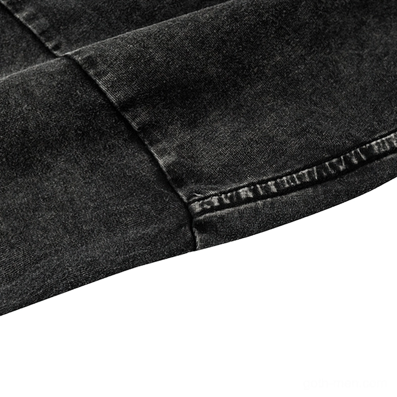 Gothic tee side seam construction detail, reinforced stitching on black cotton