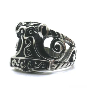 Gothic Thor's Hammer Mjolnir Viking ring in polished 316L stainless steel with intricate hollow Nordic scroll carving design - front side view