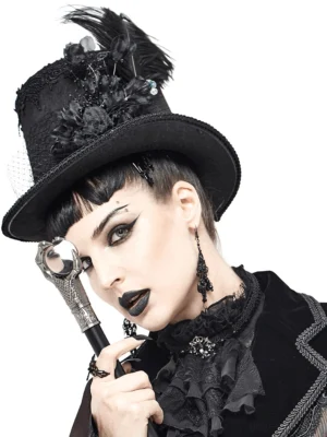 Black gothic top hat with detachable ostrich feather and 3D fabric flowers, left three-quarter view on model with lace trim and monocular accessory