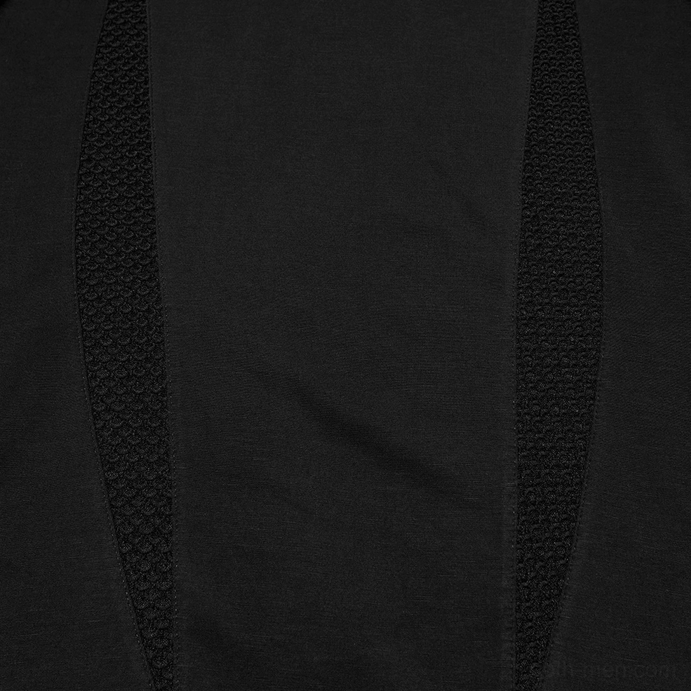Close-up texture detail of black gothic mesh panel showing breathable see-through mesh fabric contrast