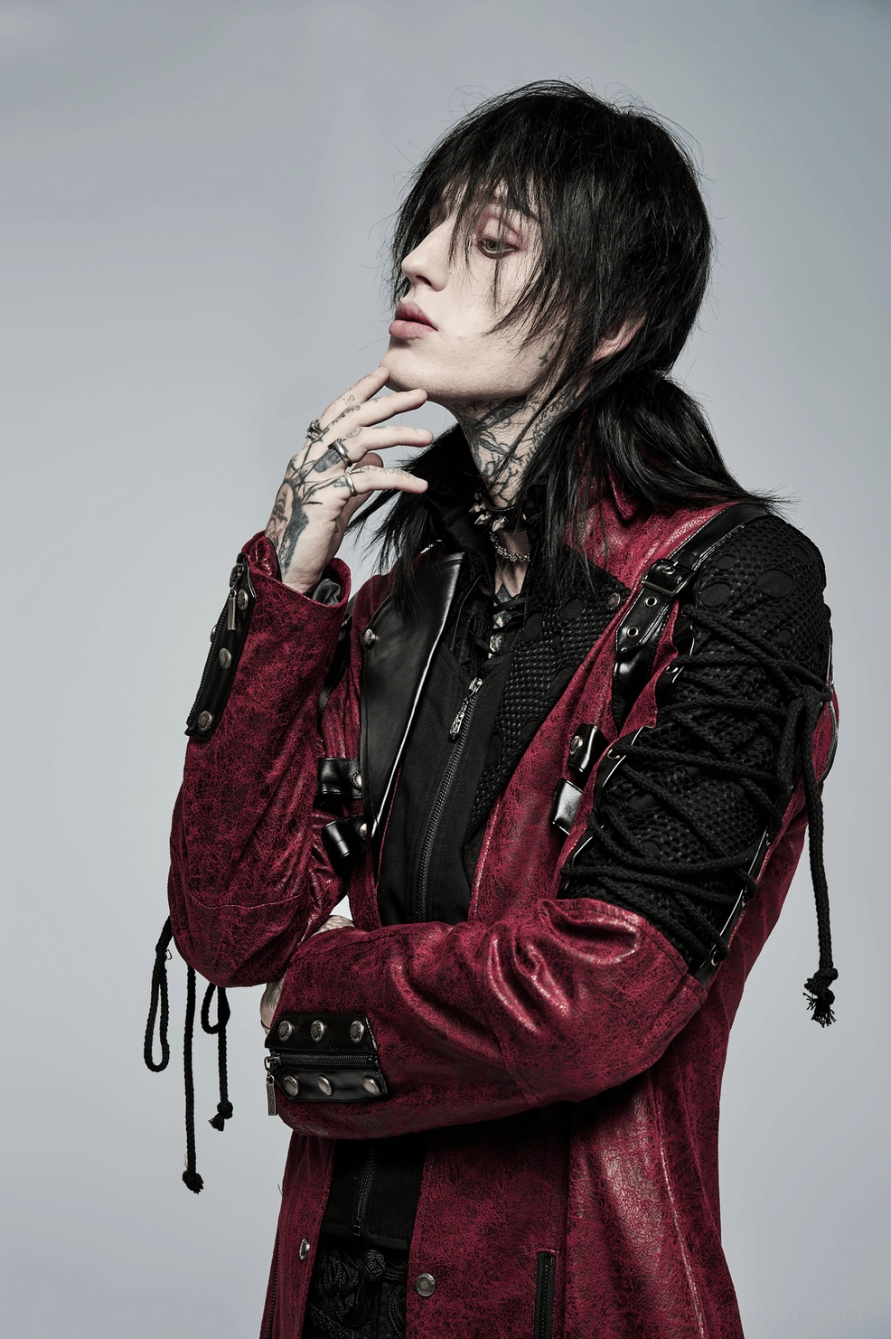 Burgundy gothic trench coat worn styling with alternative fashion accessories and dark aesthetic
