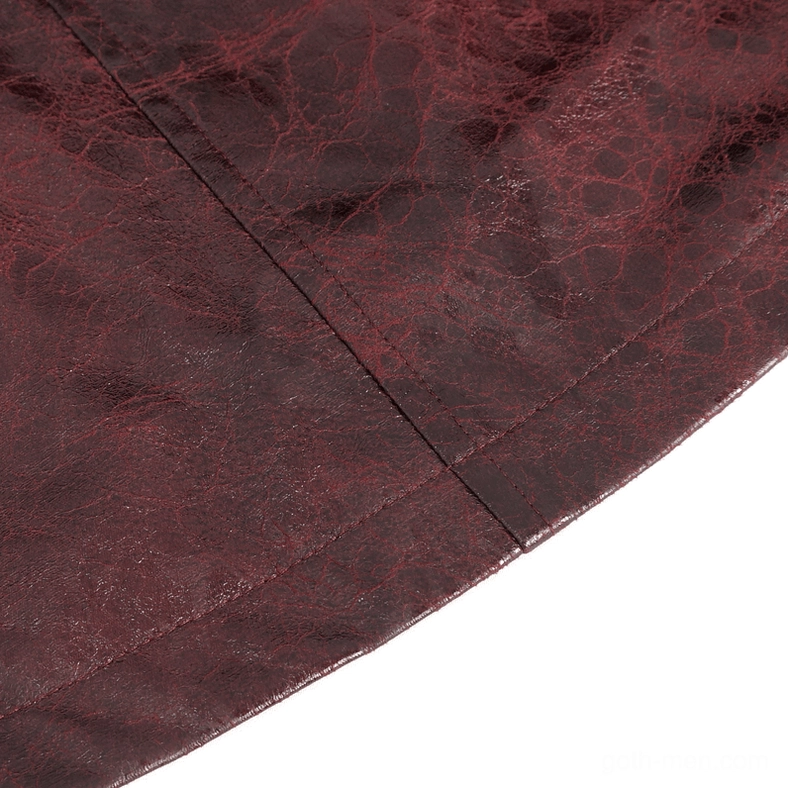Detailed view of cracked burgundy faux leather texture and seam stitching on goth coat
