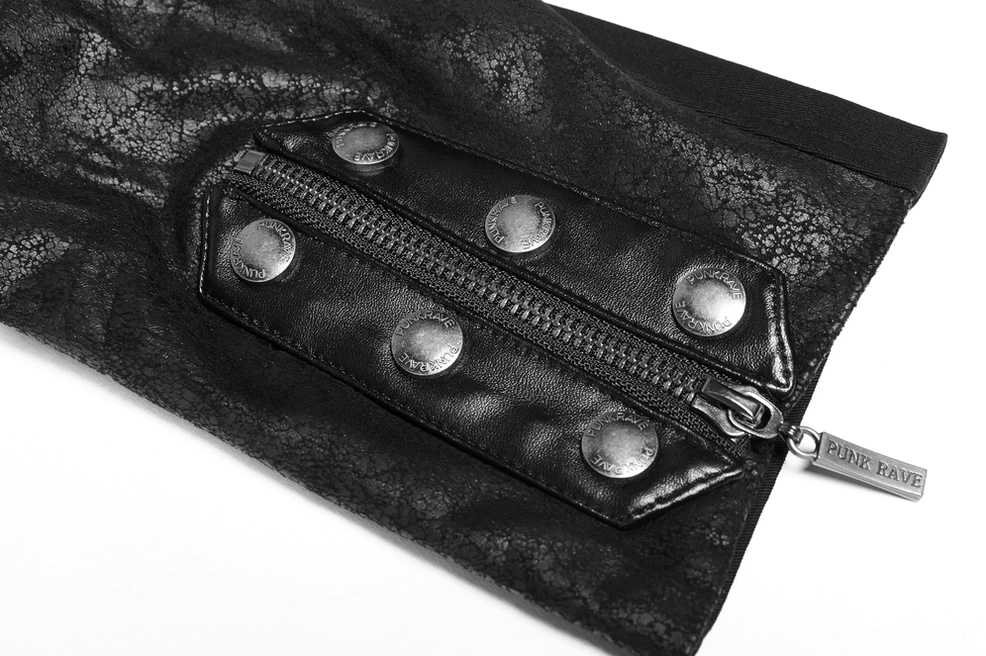 Close-up detail of gothic trench coat metal zipper, snap buttons and branded hardware
