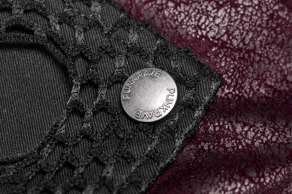 Embossed metal button detail on burgundy gothic leather trench coat showing craftsmanship and hardware