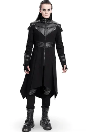 Black gothic trench coat with synthetic leather panels front view on male model, featuring high collar with metal buckles and asymmetrical hem design