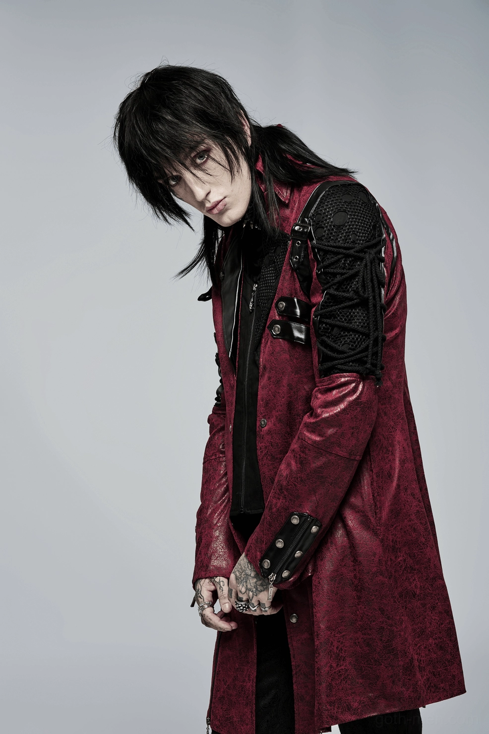 Burgundy gothic trench coat texture detail showing leather and polyester fabric contrast