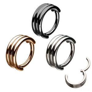 Triple-layer gothic stainless steel clicker nose ring collection in black, silver, and rose gold finishes - flat lay overhead view on white background