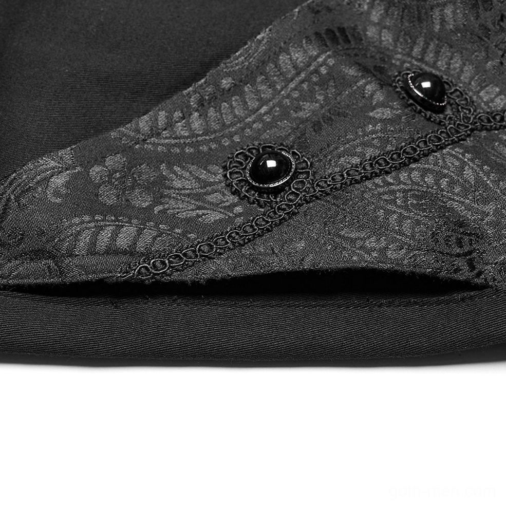 Detailed view of hand-sewn decorative button on black jacquard gothic trousers with embossed texture