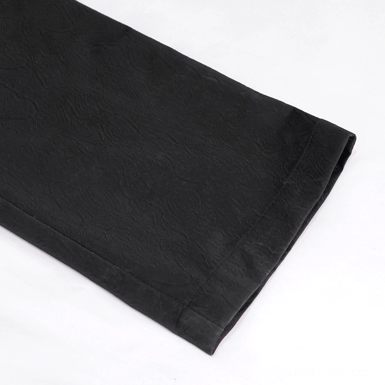 Gothic trousers side waist detail showing velvet lace-up straps with embroidered floral trim