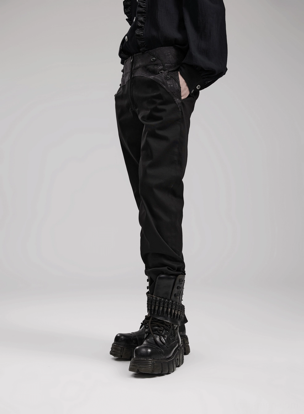 Side seam pocket detail on black jacquard gothic trousers, showing functional webbing loop construction