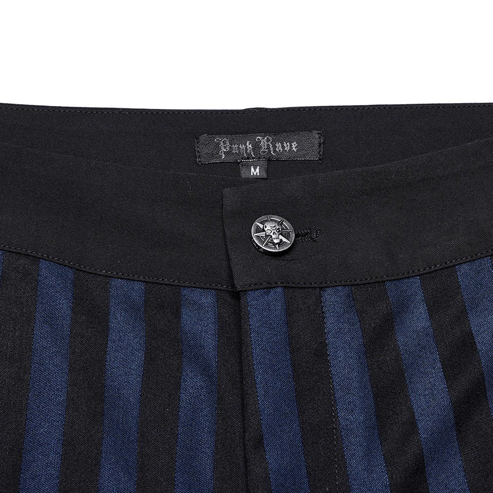 Front waistband close-up of black-blue gothic trousers showing brand tag and metal button hardware