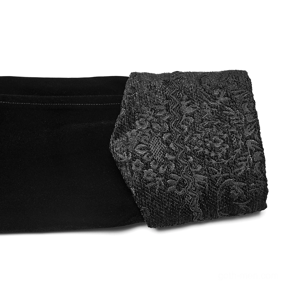 Black gothic velvet coat cuff detail showing jacquard patterned edges and fitted sleeve construction