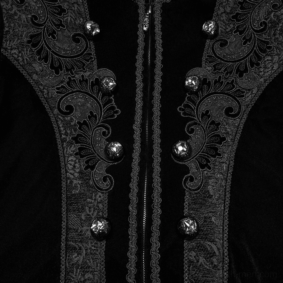Black gothic velvet coat front placket close-up highlighting floral jacquard trim, metal decorative buttons, and zip fastener