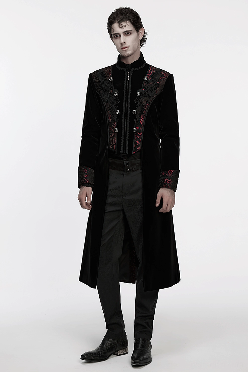 Side angle of gothic velvet coat highlighting length and fitted construction on model