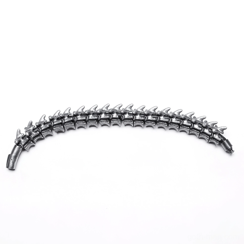Side profile view of vertebra spike metal arm cuff with curved spine design