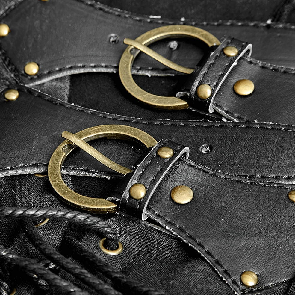 Macro close-up of antique brass metal buckle hardware on gothic vest, showing rivet fasteners and leather strap attachment details