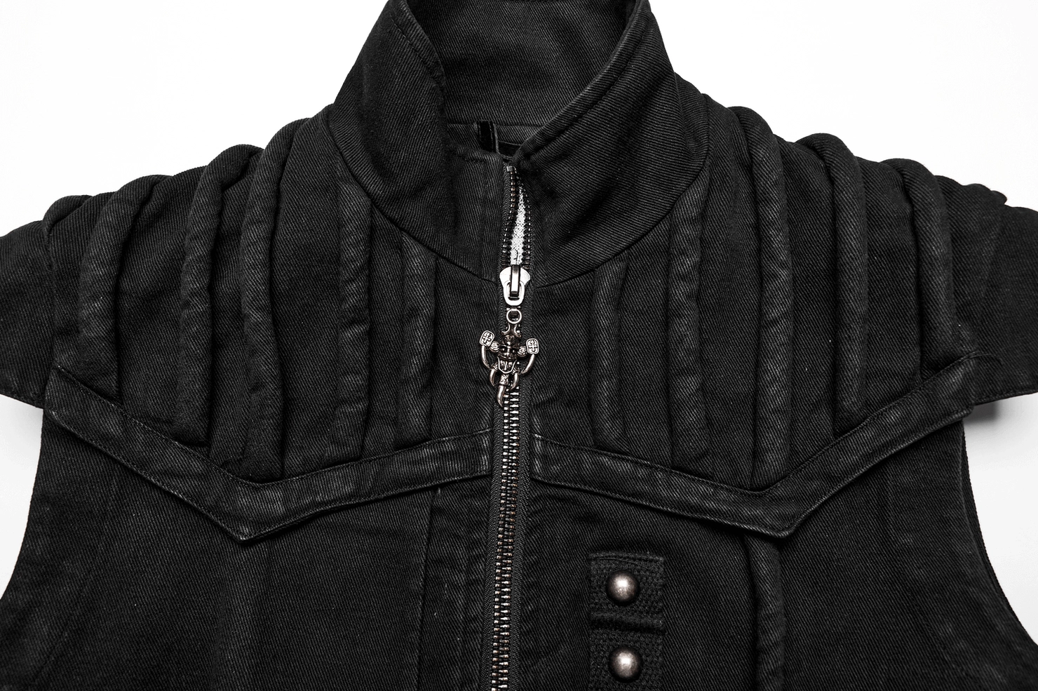 Close-up detail black gothic vest stand collar with studded pocket flap and ribbed shoulder panels