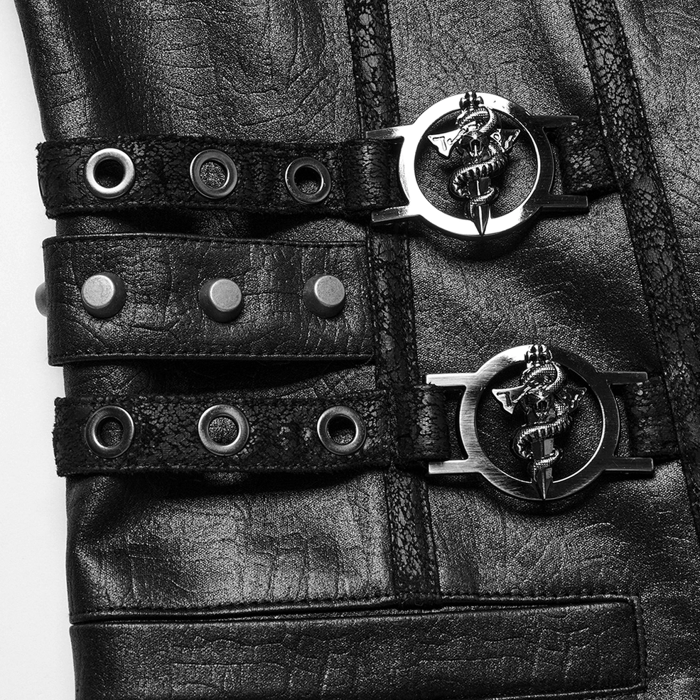 Macro photography of dragon-themed metal rings and round rivet studs on gothic vest hardware