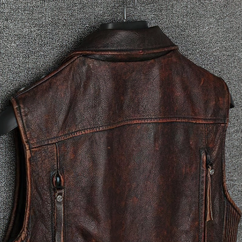 Men's genuine leather motorcycle vest metal hardware and decorative elements detailed view