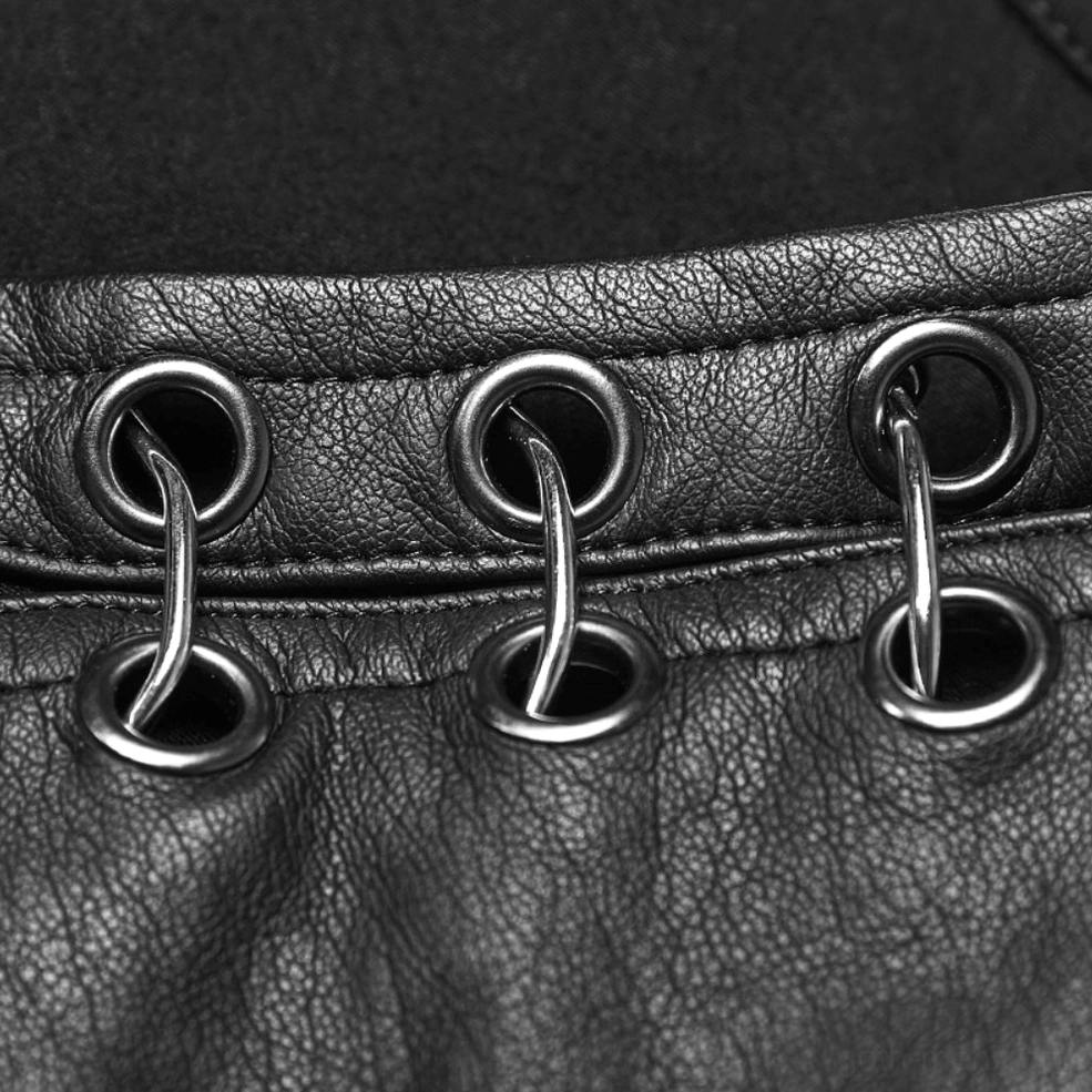 Close-up of heavy-duty metal eyelet grommets on faux leather with stacked metal hardware detail