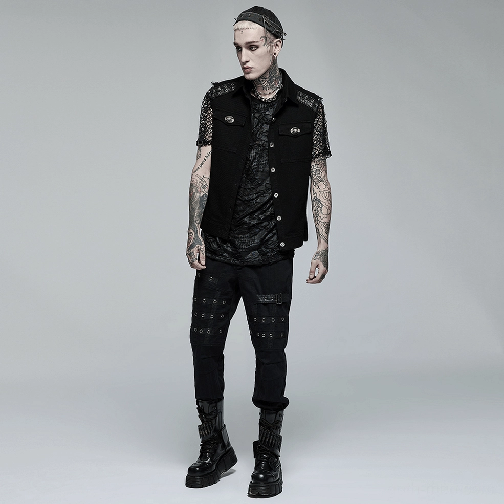 Full-length front view of black gothic studded vest on male model showing how it layers and wears