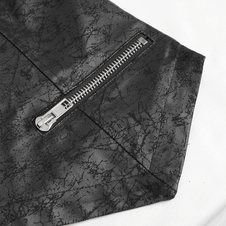 Close-up detail of side oblique zipper and cracked textured black fabric on gothic punk vest