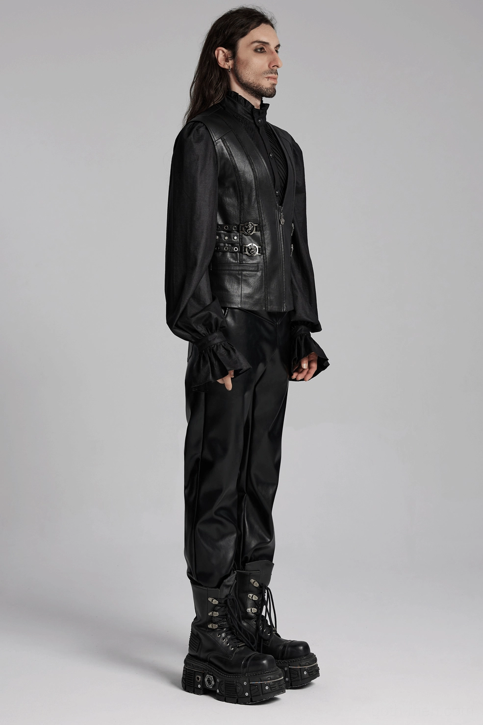 Three-quarter angle view of black gothic faux leather vest displaying structure and fit